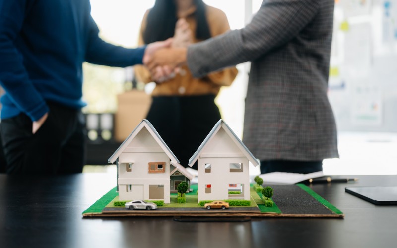Customers who choose to buy a condominium room and a bank approve a loan for their purchase. Condominium and house loan interest rate from bank concept in office